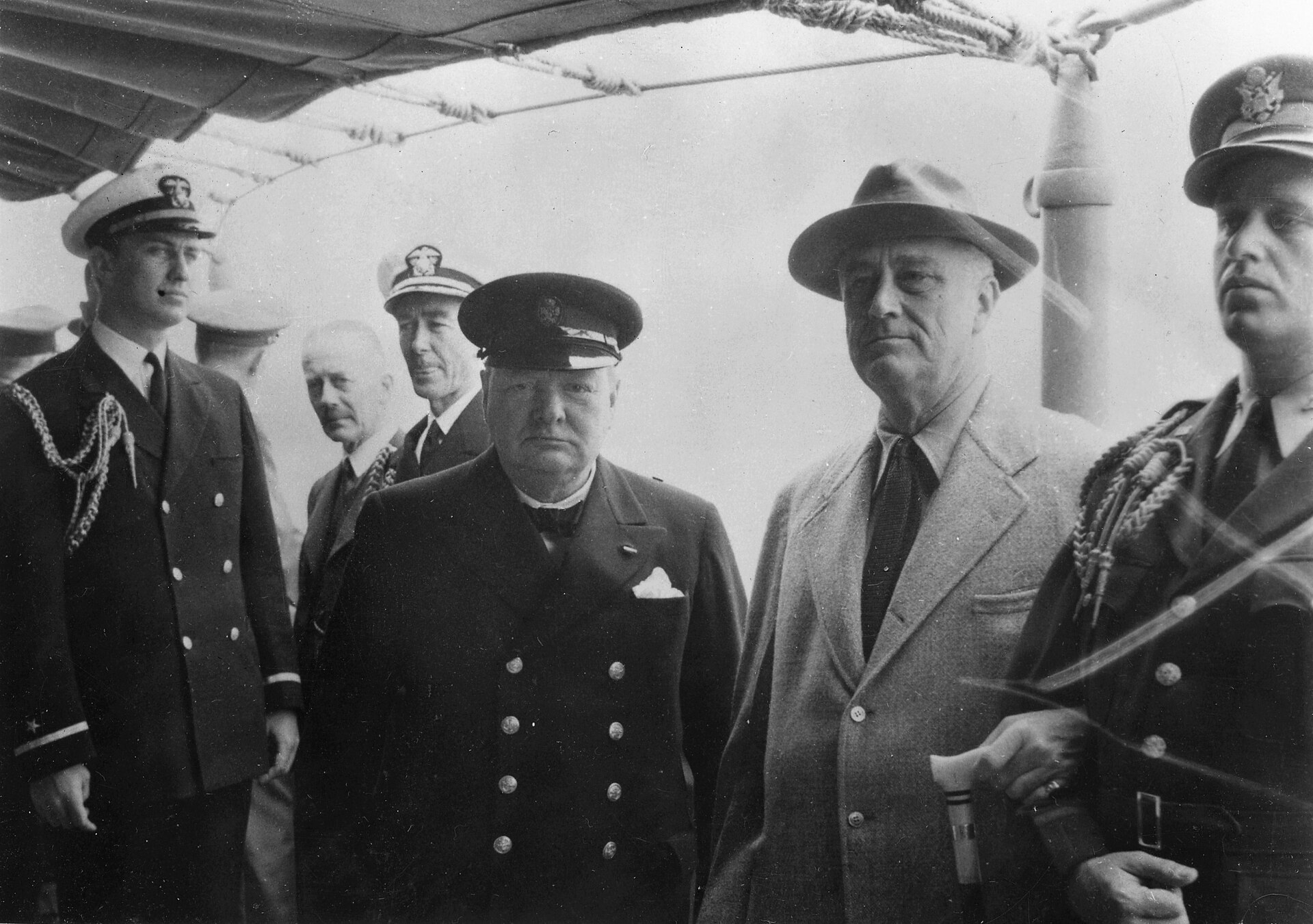 Franklin Roosevelt and Winston Churchill meet aboard the cruiser USS Augusta during the Atlantic Conference.
