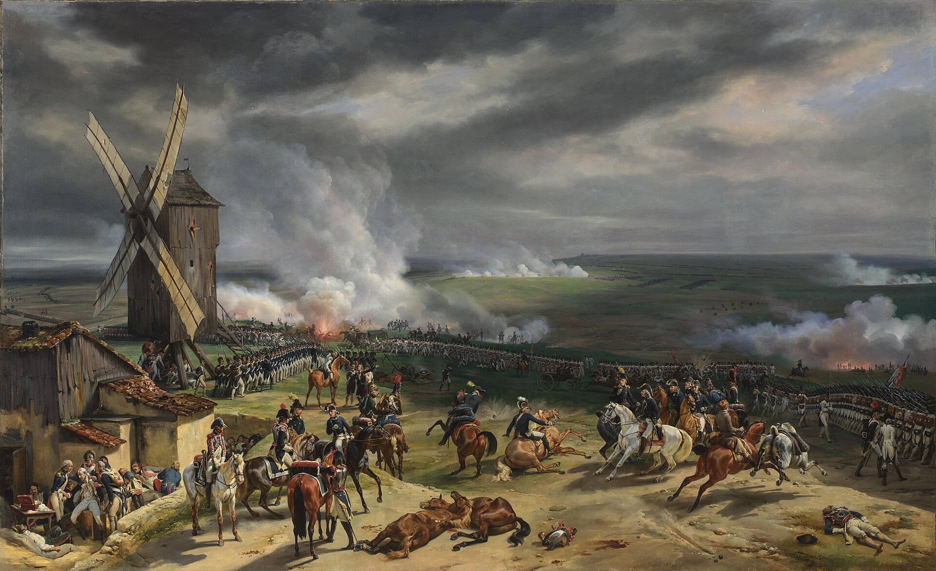 French revolutionary soldiers gather around a windmill as artillery smoke rolls across the battlefield at Valmy.