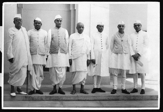 Seven members of India's interim government stand outside the Council Room at the Viceroy's House in New Delhi.