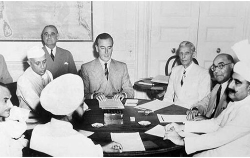 Lord Mountbatten sits with Jawaharlal Nehru, Muhammad Ali Jinnah, and other leaders during partition talks.
