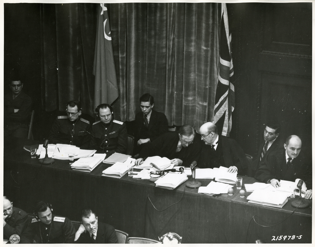 The international panel of judges and prosecution attorneys sits in the Nuremberg courtroom in November 1945.