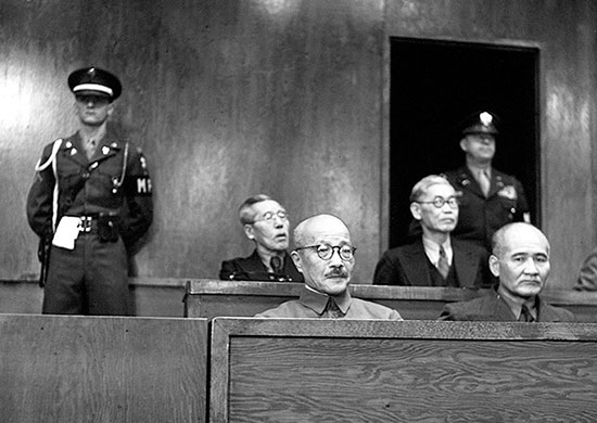 Japanese wartime leaders, including Hideki Tojo, sit in the defendants' dock at the Tokyo war crimes tribunal.