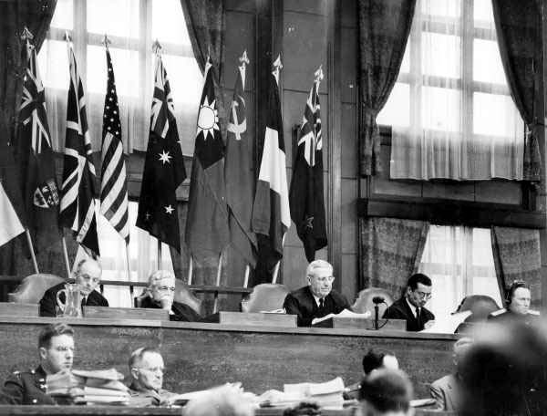 Chief judge William Webb presides over the crowded courtroom of the International Military Tribunal for the Far East in Tokyo.
