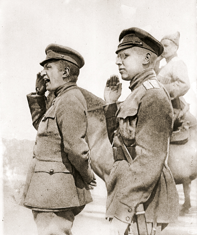 Alexander Kerensky stands on a platform and addresses a tightly packed crowd of Russian soldiers in 1917.