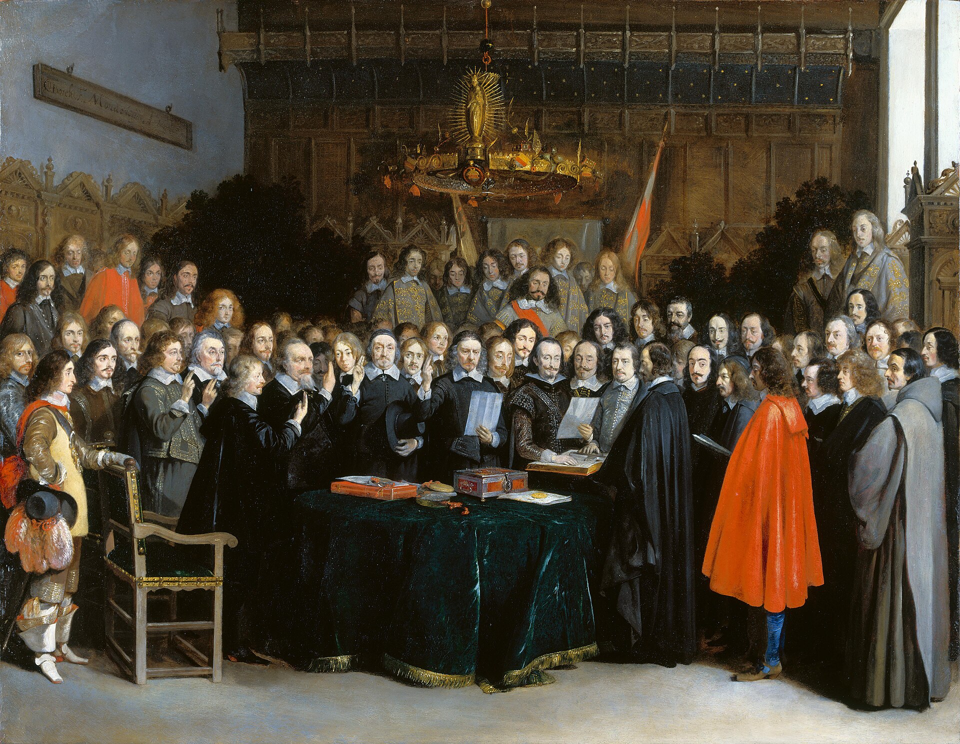 Delegates crowd a panelled hall, hands raised over documents as the oath of ratification is sworn.